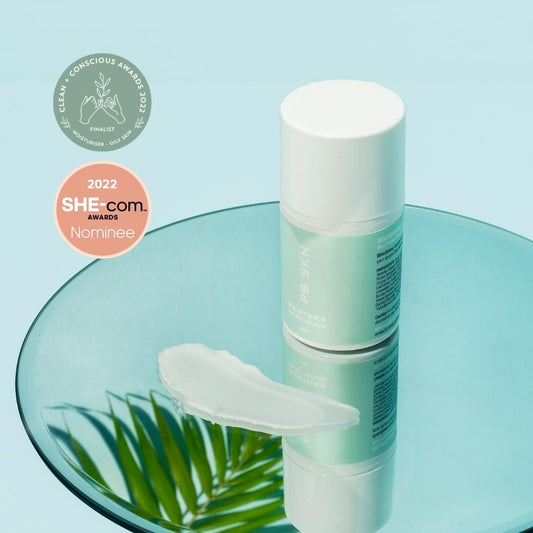 PB SKN restore post-workout daily moisturiser for active lifestyles with mirror and palm leaf