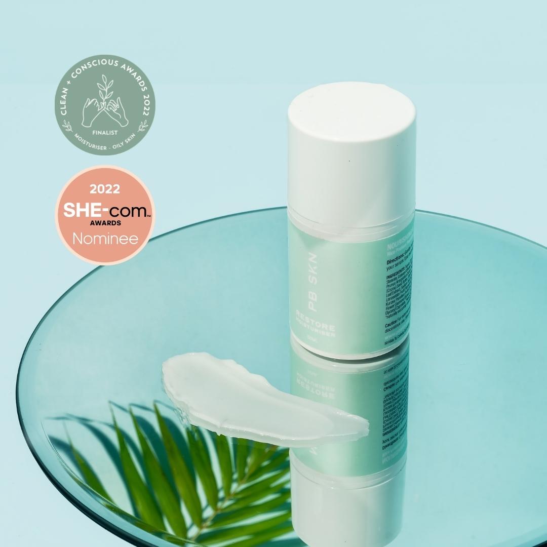 PB SKN restore post-workout daily moisturiser for active lifestyles with mirror and palm leaf